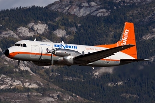 HS748 Unloading freight in Old Crow