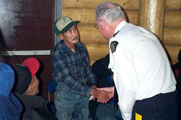 Commissioner Murray and Elder Andrew Tizya.
